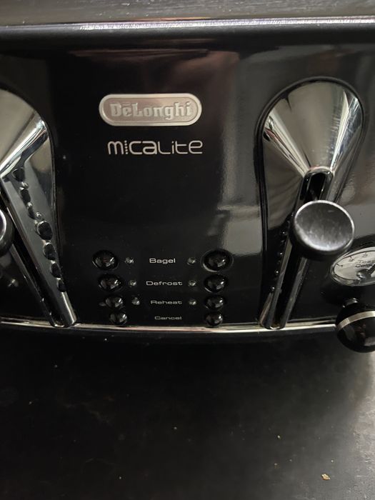 Тостер Delonghi с четири гнезда