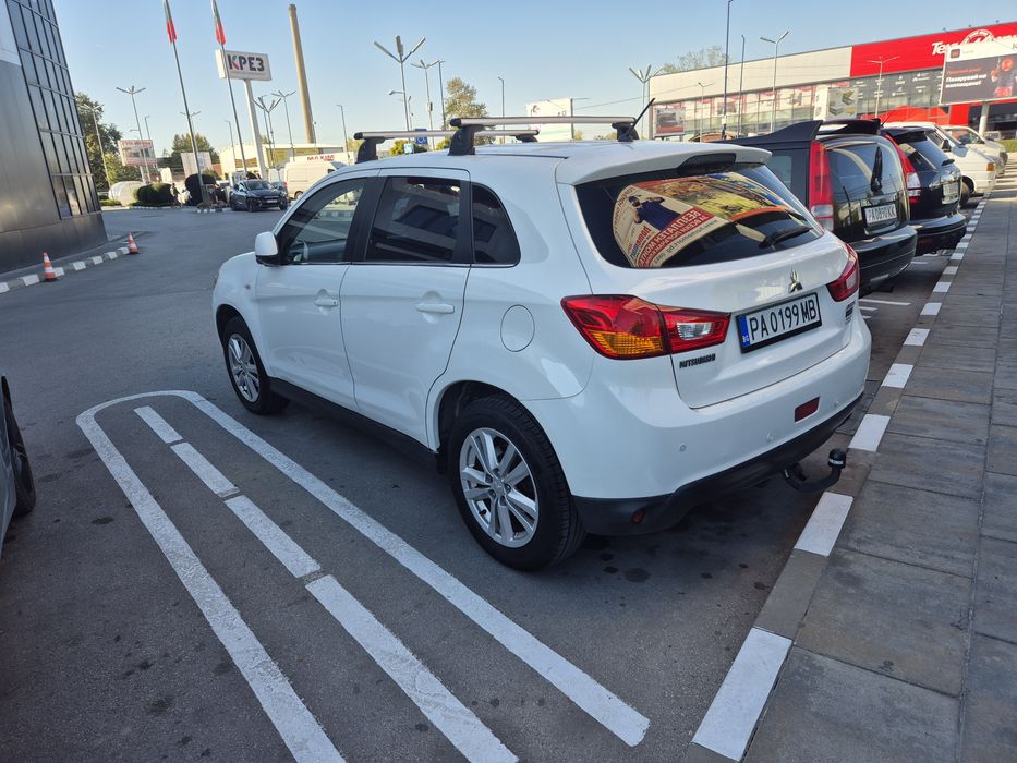 Mitsubishi AXS 2013год.