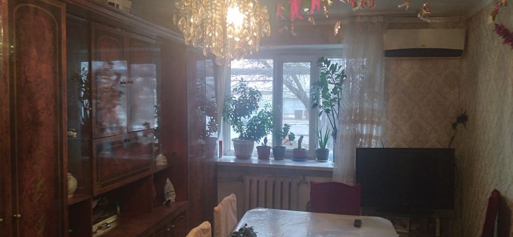 Үш бөлмелі пәтер.