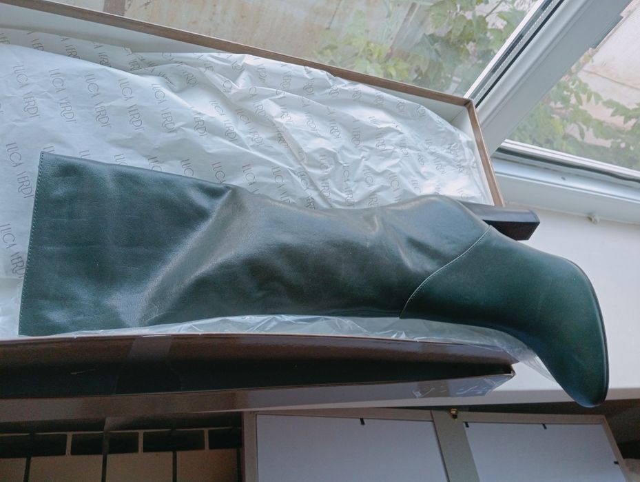 Продам сапоги новые