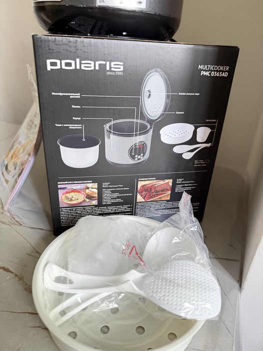 Продам мультиварку Polaris , черная