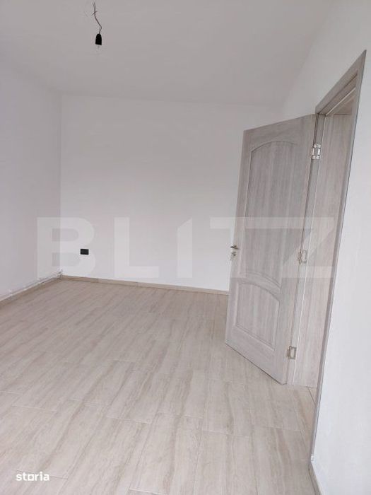 Casa de vanzare, cu 6 camere, 288 mp, zona Voinesti
