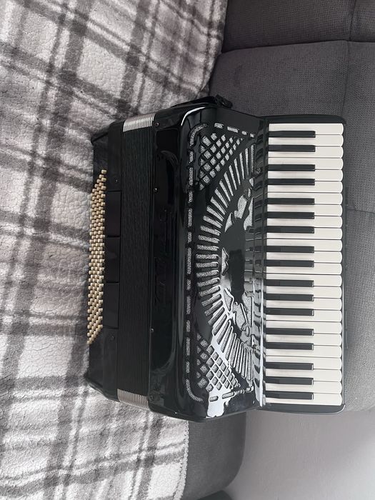 Acordeon cu camera dubla