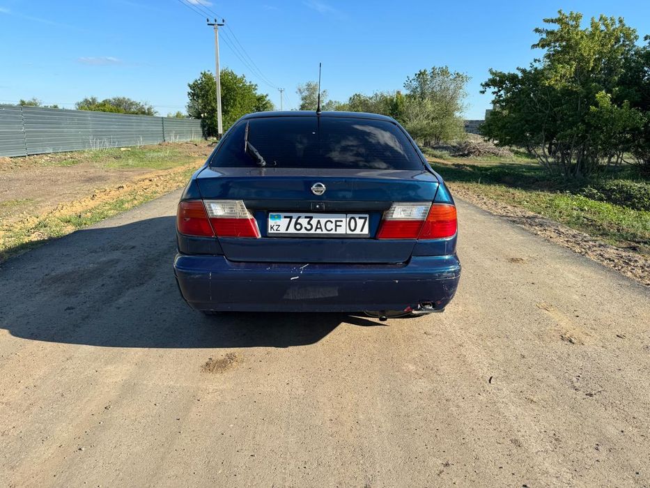 Ниссан примера п11