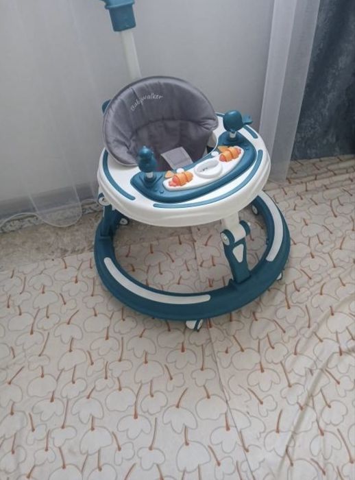 Продам детский ходунок новый