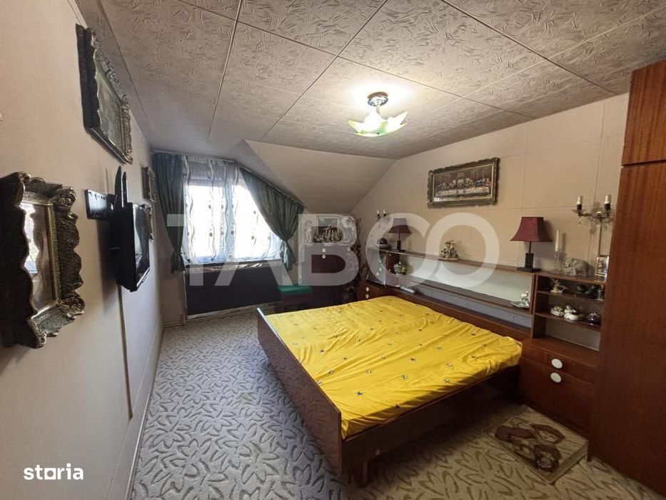Casa individuala cu 5 camere +spatiu comercial  3 bai Sibiu