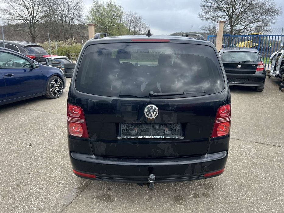 Vw Tuaran 1.9 105кс.код на мотора BLS 2009г.