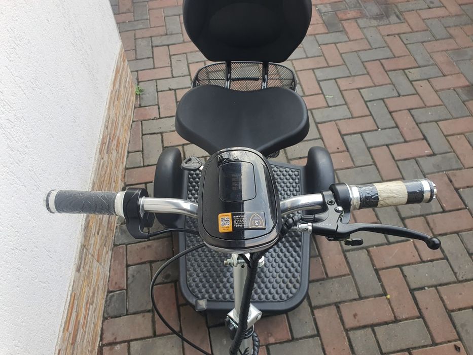 Triciclu electric aproape nou imp germania