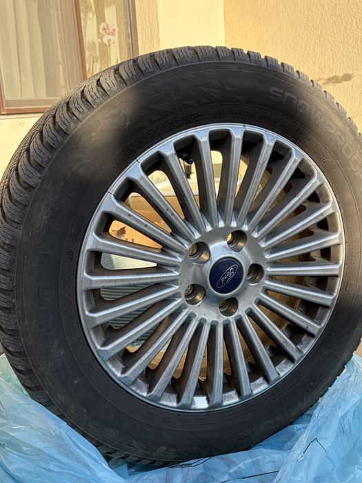 Vand roti complete Ford 16 cu anvelope de iarna aproape noi