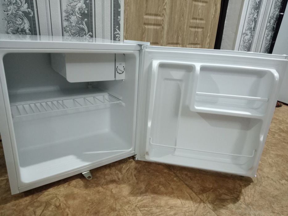 Продам мини холодильник новый