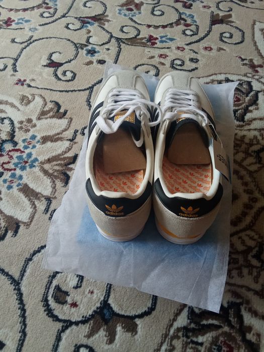 Новый кроссовки купил в России