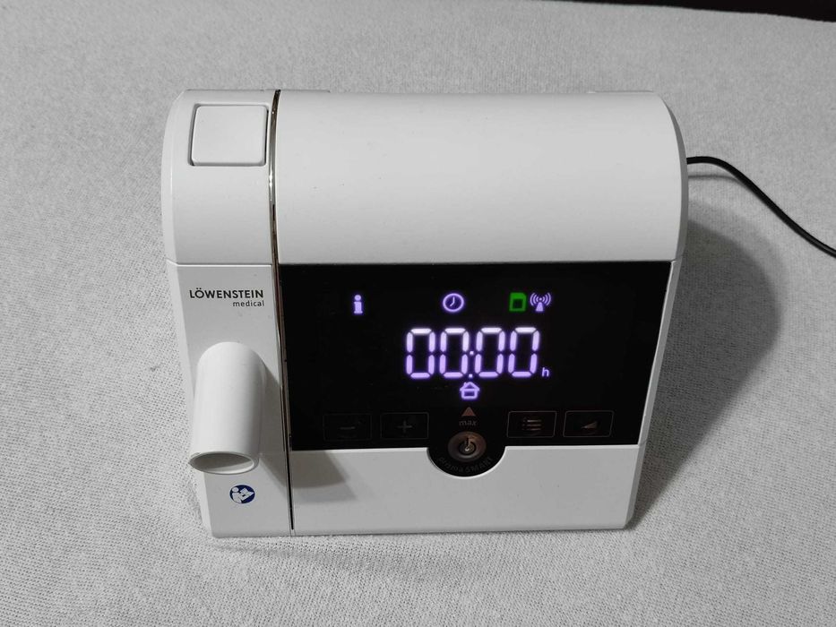 Aparat AutoCPAP Prisma Smart Plus Lowenstein, apnee, hipopnee sau flux limitat + alimentatorul original + SD card