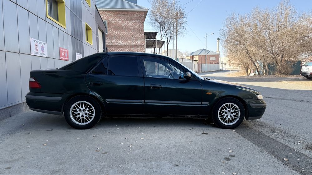 Мазда 626 птичка