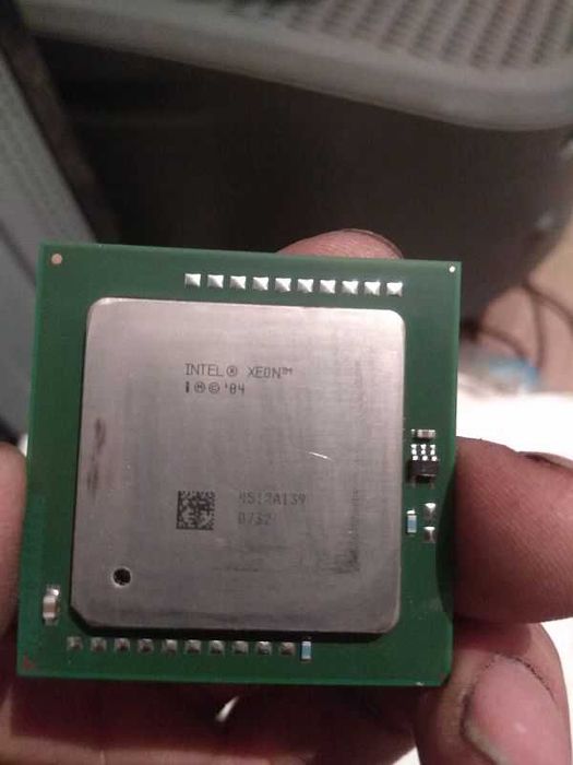 Два процессора "INTEL SL7PD XEON CPU 2800dp/1m/800".