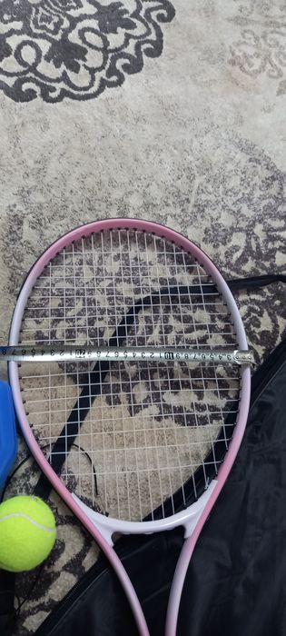 Теннисный ракетка