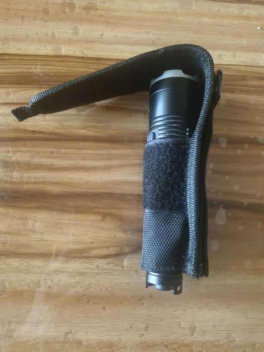 Продам фонарь NITECORE MH27UV