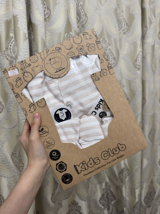 комплекты одежды для новорожденных