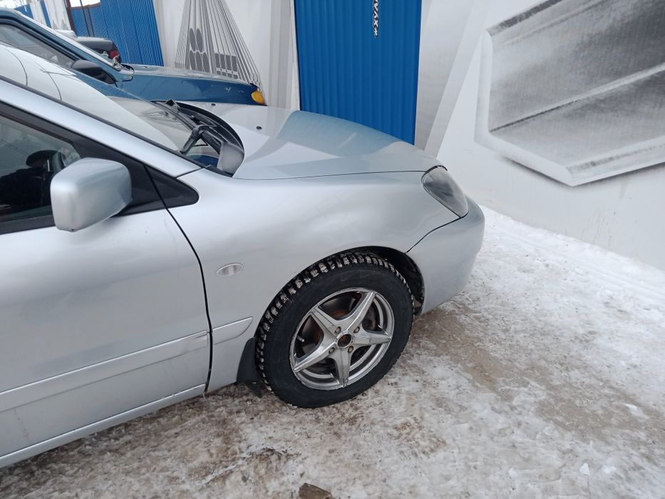 Мицубиси Лансер 9