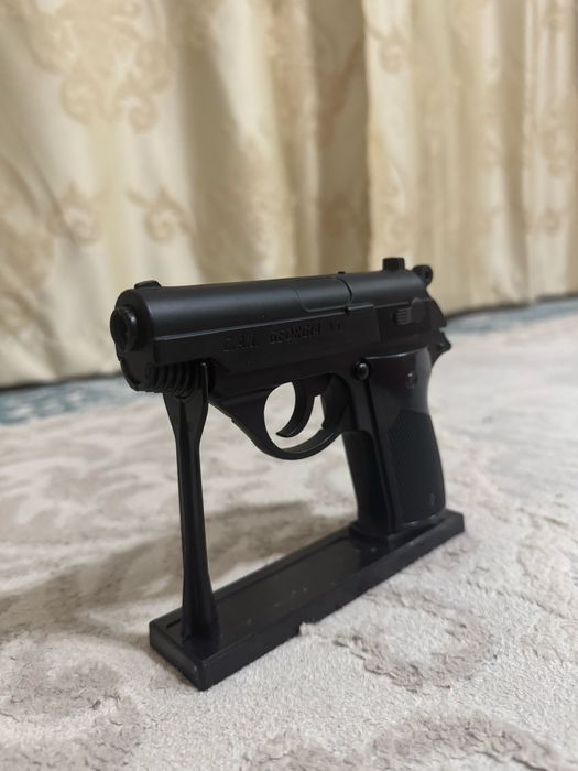 Зажигалка пистолет игрушка