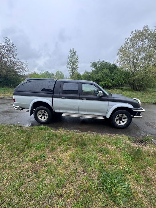Mitsubishi L200 4x4 • 2.5 Diesel • 2006 • Echipată Off-Road • Întreținută • 7000€ Neg

Mitsubishi L200 2.5 diesel, an 2006, autoutilitară, al doilea p