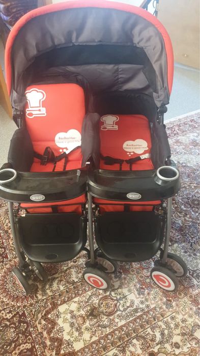 Двухместная коляска