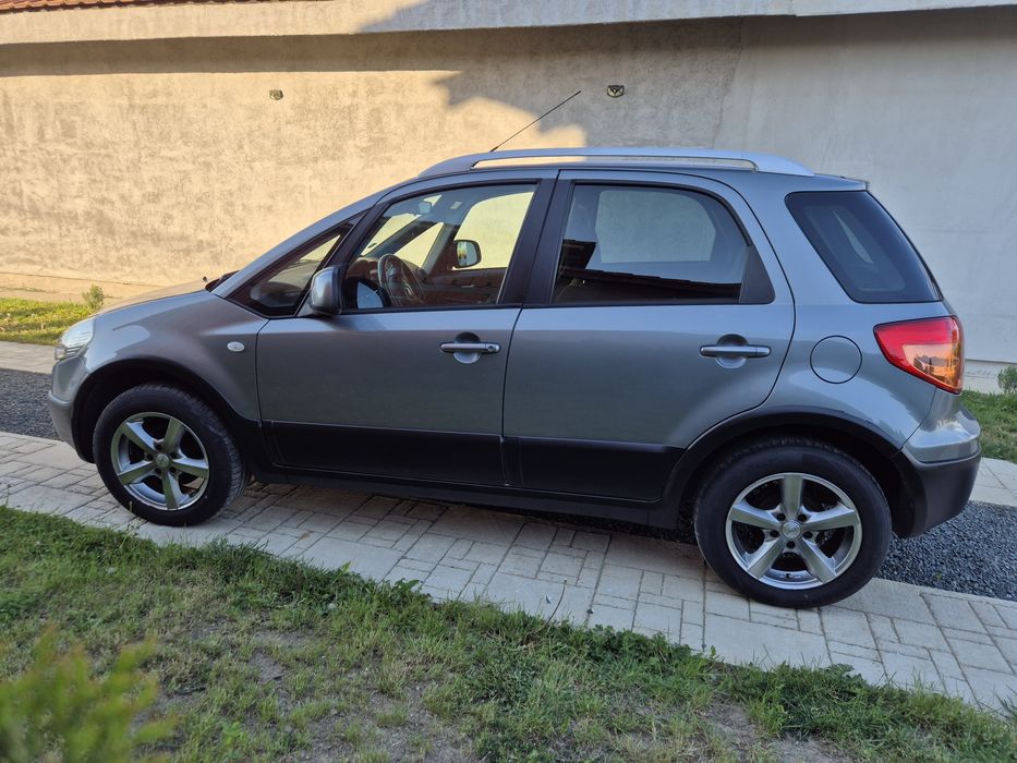 Fiat Sedici (Suzuki SX4) 1.9 Multijet 120 Cp  6+1 Viteze  4x4 Climatronic Navigatie