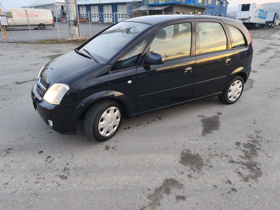 Meriva ,barii,usi,haion,scaune,bord,alernator,elecromotor,compresor ac