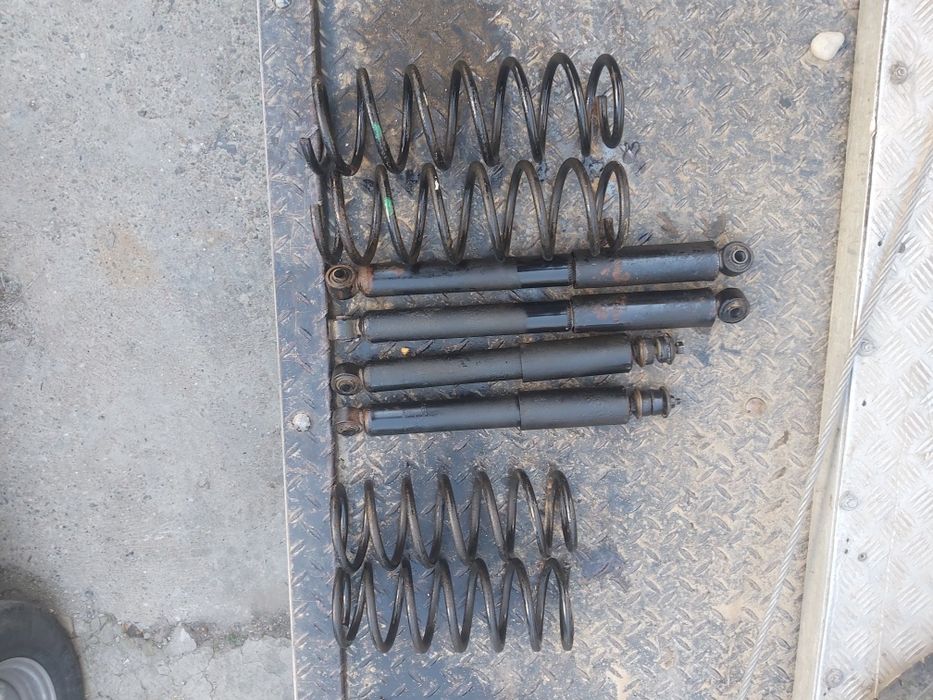 Оригинални амортесьори и пружини Сузуки Джимни  KYB