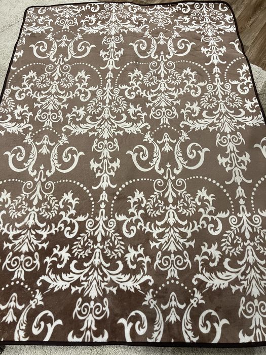 Универсальный коврик размером 191х135.