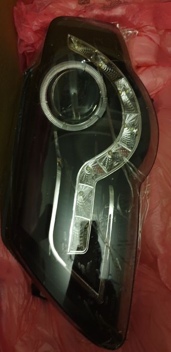 Передние фары Passat b6