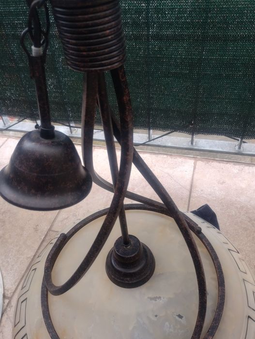 O pereche de candelabre  fier forjat