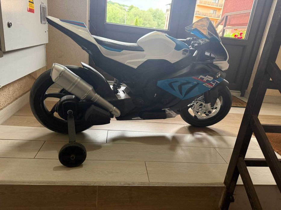Vând motocicleta BMW copii electrica