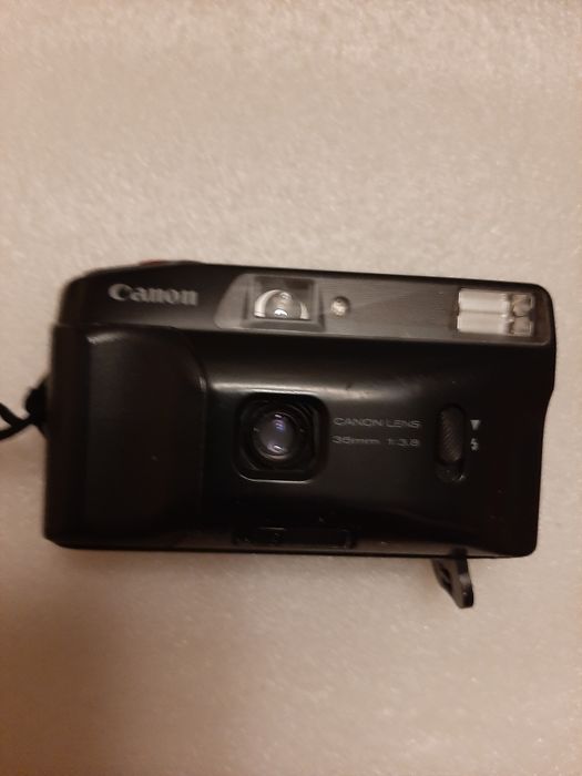 Фотоаппараты советские пленочные зенит и canon из англии