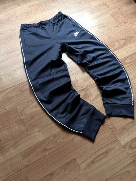 Pantaloni training pants joggers tapered leg Nike blue poliester
