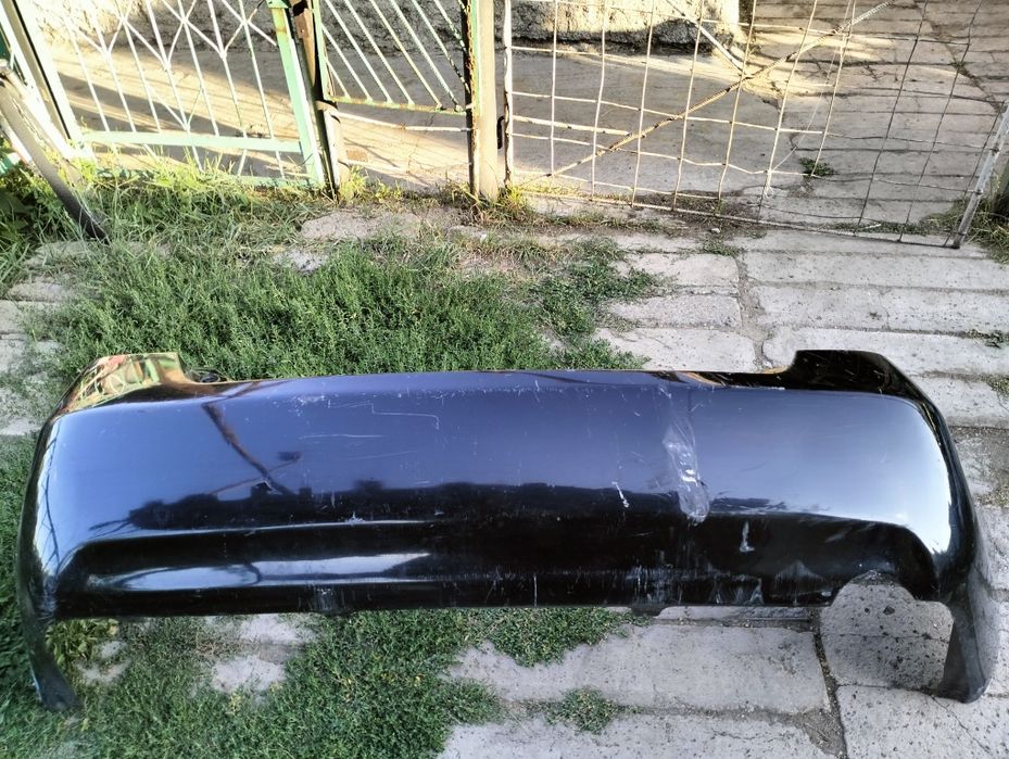 Задний бампер Toyota Camry 40