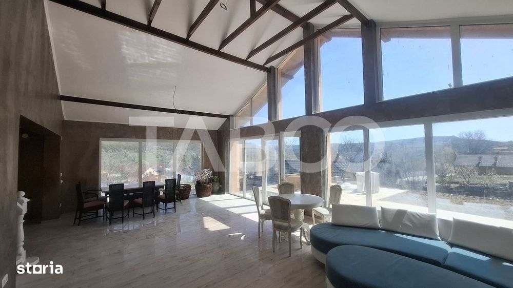 Casa de vanzare 405 mp utili 2 garaje 250 mp terase Slimnic Sibiu