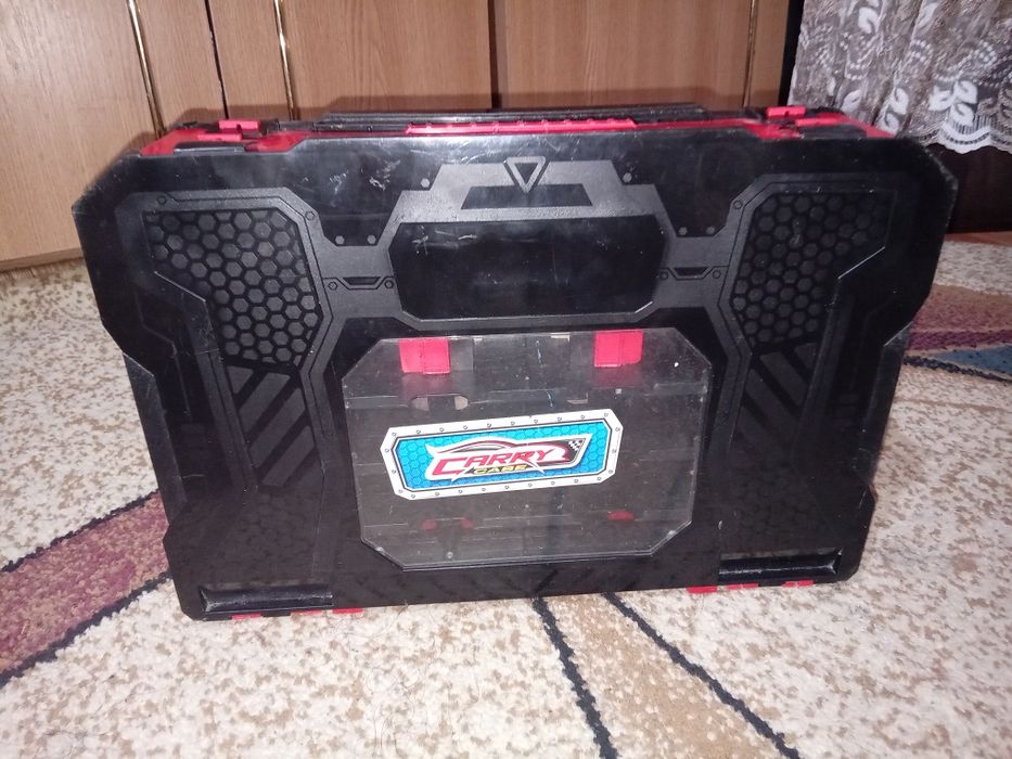 Servietă  pentru mașinuțe.