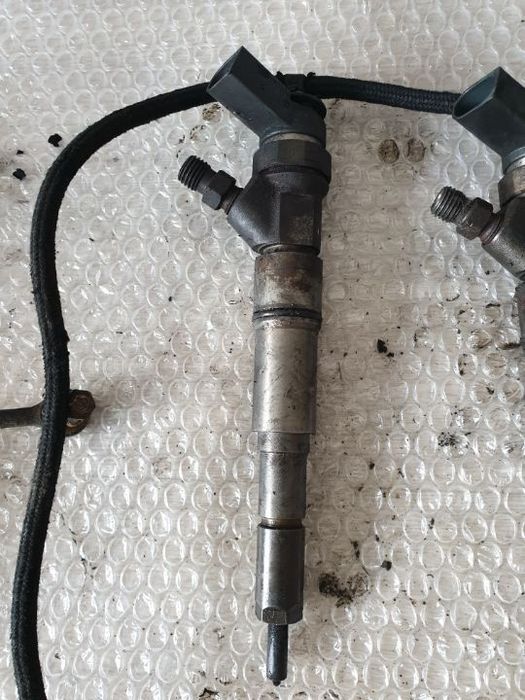 injector bmw 730 seria 7 e66 e67 e65 3.0d  7789661 0445110131