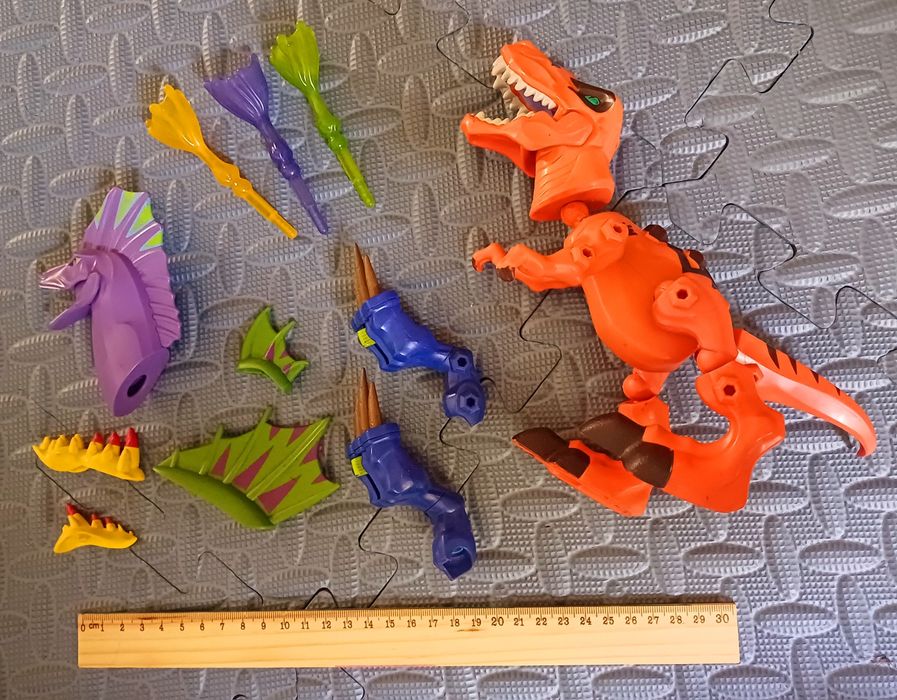 Игрушки динозавры трансформеры роботы
