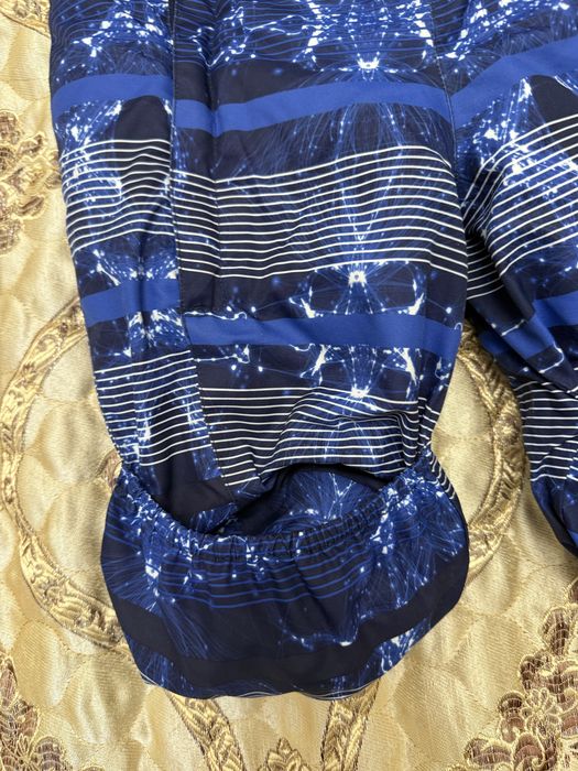 Продам зимний комбинезон Huppa