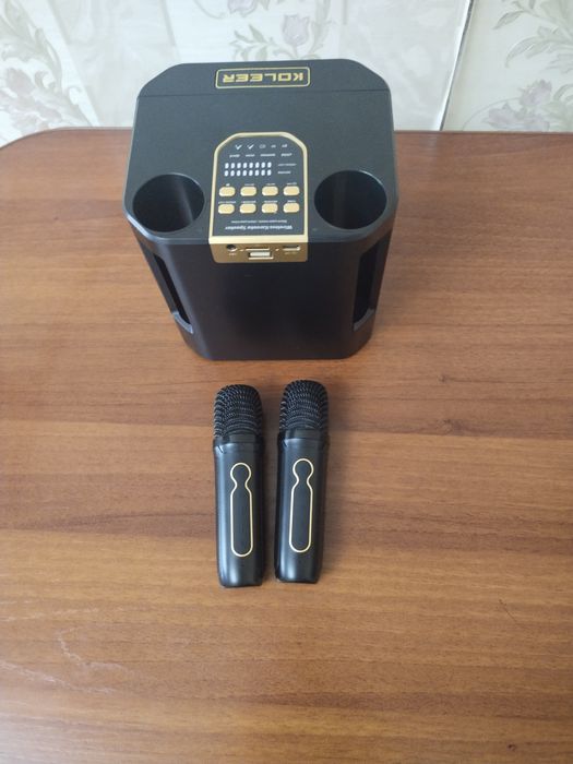 Продам караоке с двумя микрафонами