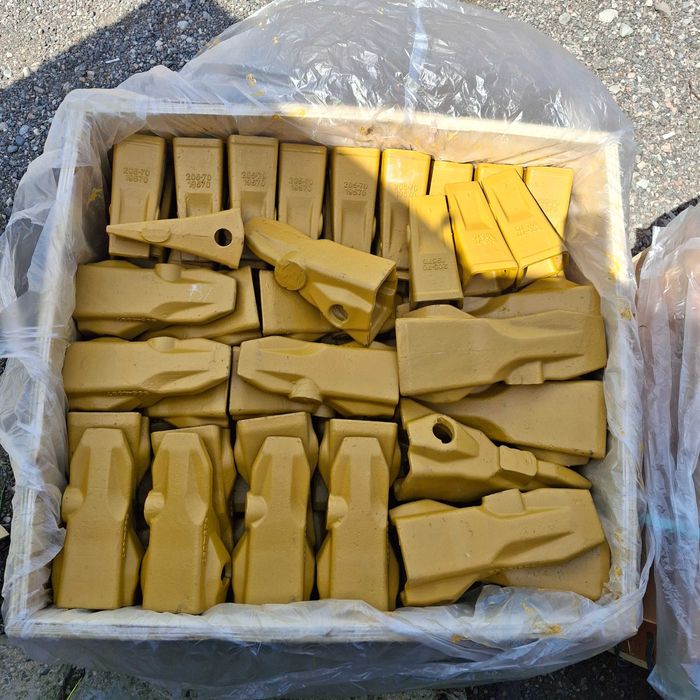 Коронки • Зубья • Защиты • Адаптеры ковша