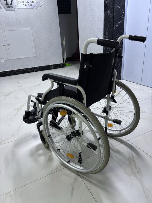 Инвалидная коляска