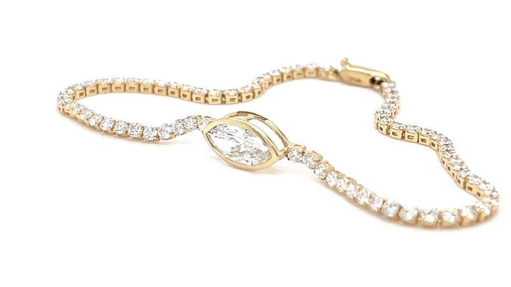 Brățară 14 ct aur galben cu 73 diamante (3.09 ct) – elegantă, de lux.