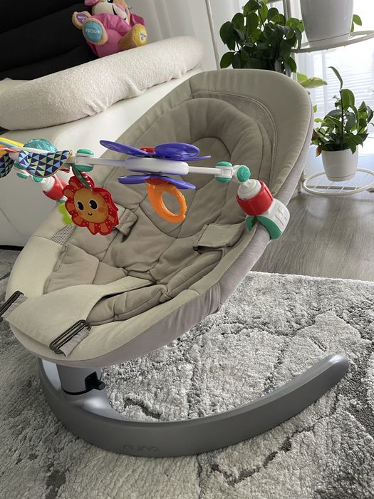 Nuna leaf bej + cadou bara cu jucarii