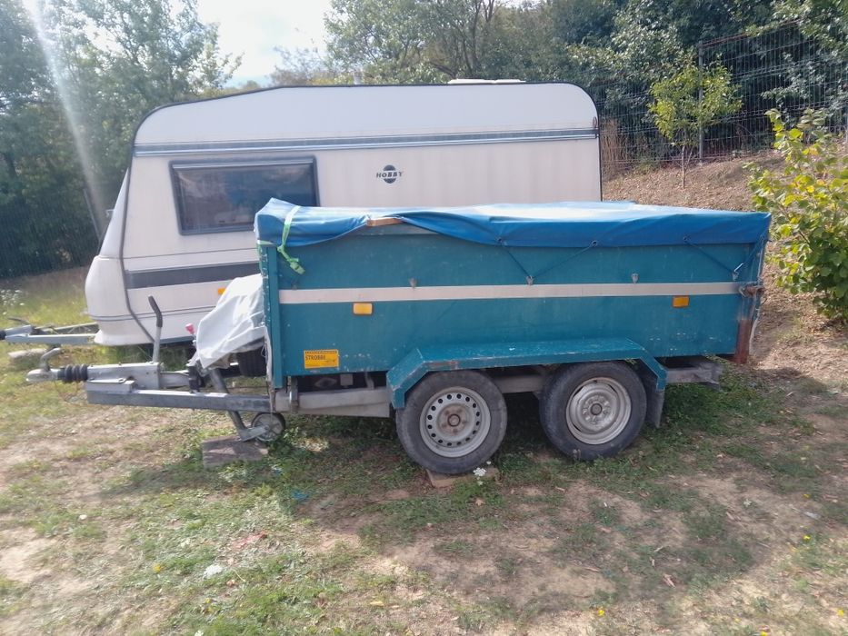 Vând remorca basculabila cu baterii  lungime 265  lățime 135  înălțime 80 aluminiu