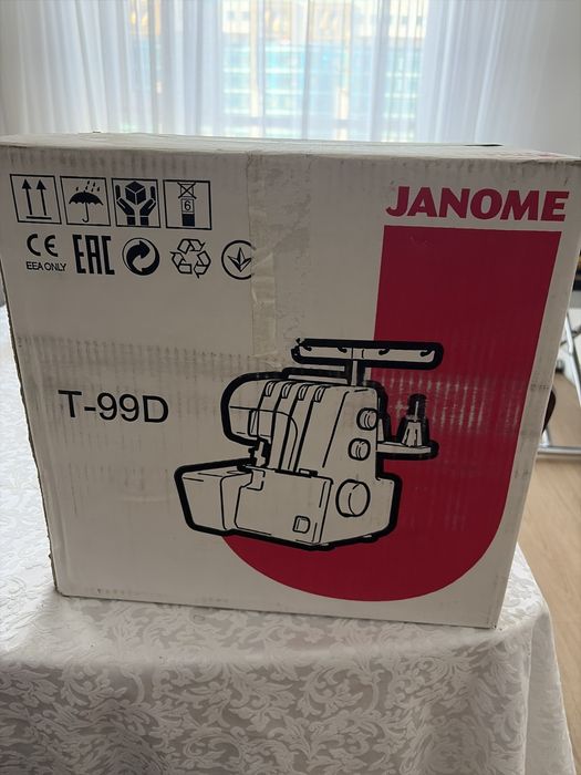 Оверлок машинка T-99D Janome