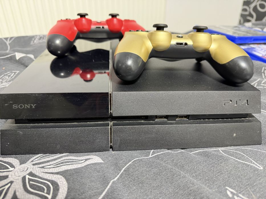 OFERTA PlayStation 4 Fat + 2 controllere + jocuri incluse