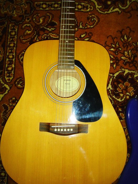продам гитару Yamaha F310 cостояние новое.