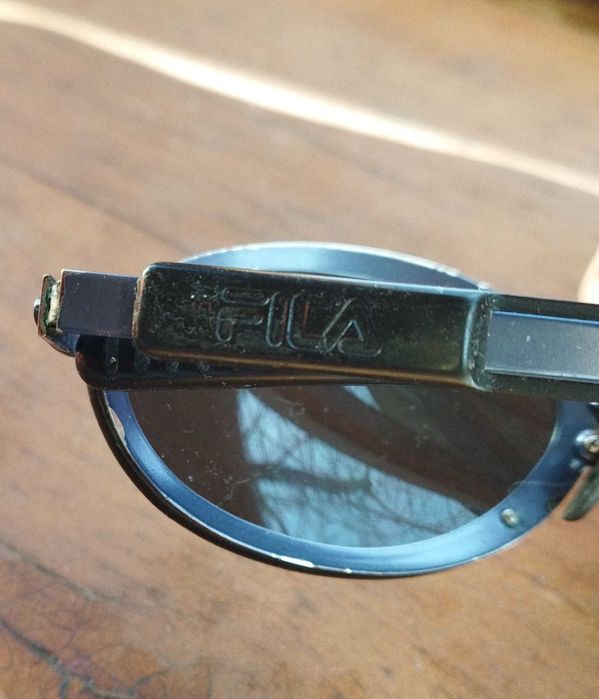 Солнцезащитные очки брендовые